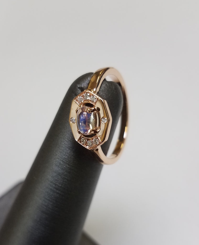 Dainty Moonstone and Diamond Vertical Ring seen on prop